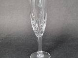 a close up of a wine glass on a table