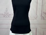 a picture of a black and white dress on a mannequin