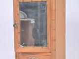 a small wooden cabinet with a mirror on top of it