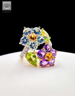 an image of a close up of a ring with flowers on it