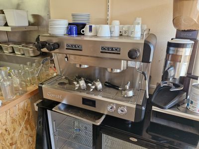 a coffee machine that is sitting on top of a counter