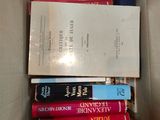 a box full of books that are sitting on a table