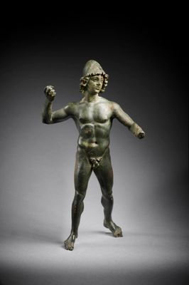 an image of a bronze statue of a man holding a sword
