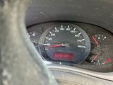 a close up of a car dashboard with a speedometer