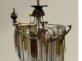 an image of a chandelier made of glass and metal