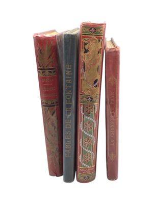 three books that are stacked on top of each other
