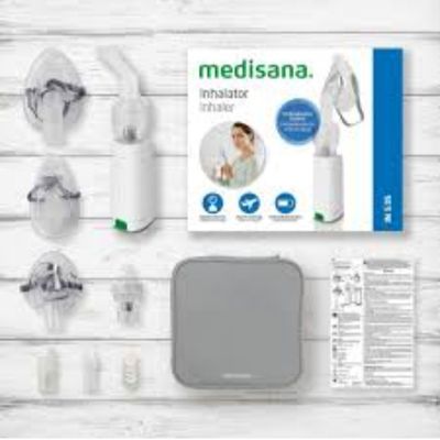 medisana inhaler with accessories on a white wooden surface