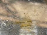 a close up of a metal pan with a label on it