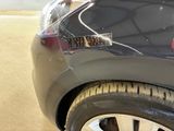 a close up of a car with a sticker on the front of it