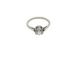 a close up of a diamond ring on a white background