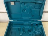 a close up of a blue tool box on a table