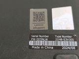 a label on the back of a laptop that says lenovo