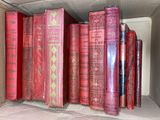 many books that are sitting in a box together