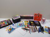 a lot of school supplies sitting on a table