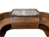 a wooden table with a marble top on top of it