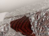 a close up of a piece of plastic wrapped in plastic wrap