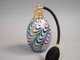 an image of a perfume bottle with a headphone attached