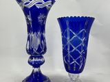 pair of cobalt blue glass vases with etched designs on the sides