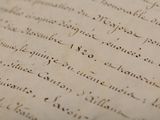 a close up of a piece of writing on a piece of paper