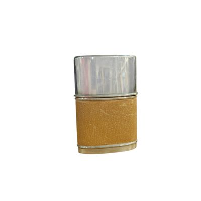 a bottle of nail polish on a white surface