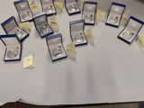 a table with a lot of rings on it