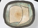 a small bowl that is sitting on a table