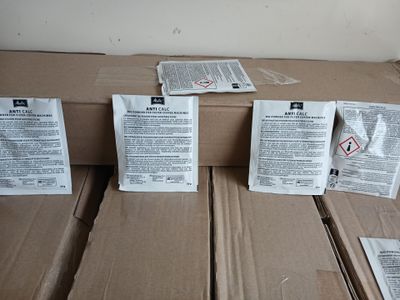 many boxes of mail sitting on the floor next to each other