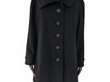 un manteau noir sur un mannequin mannequin mannequin mannequin mannequin mannequin mannequin mannequin mannequin mannequin