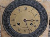 a clock that is sitting on top of a table