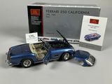 an image of a blue car with its open door open next to a boxed box