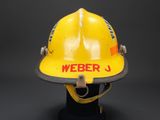 a yellow fireman ' s helmet with the word weber written on it