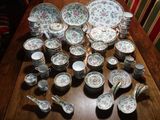 a table with a lot of plates and bowls on it