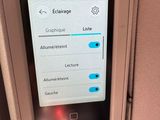 the screen on the back of a car with a remote control