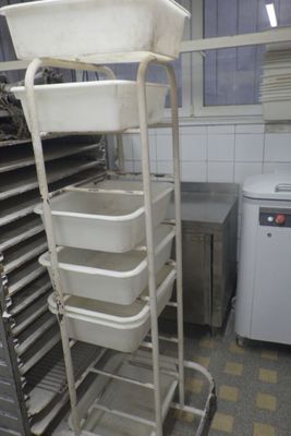 an image of a commercial kitchen with many trays of food