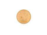 a close up of a gold coin on a white background