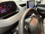 steering wheel and dashboard of a car with a digital display
