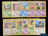 several pokemon cards are displayed on a black surface with a black background