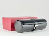 a red box with a black case and a red box with a silver handle