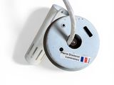 an image of a close up of a device on a white surface