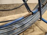 a close up of a bunch of wires on the ground