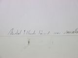 a handwriting written on the side of a wall