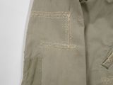 an image of a close up of a jacket with a zipper on it