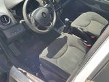 a car that has a steering wheel and a dashboard