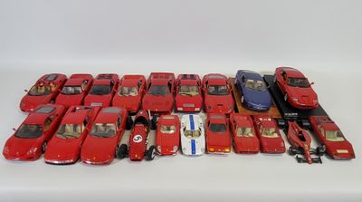 a lot of toy cars sitting on a white surface