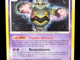 a close up of a pokemon card on a black background