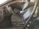 the interior of a car with two seats and a steering wheel