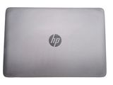 hp laptop computer with a silver back and silver keyboard
