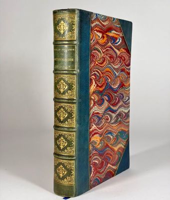 a close up of a book on a white surface with a white background