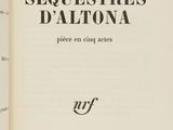 an open book with a black and white title on it