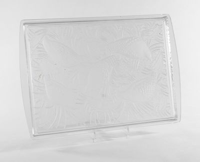 an image of a clear glass plate with a flower design on it